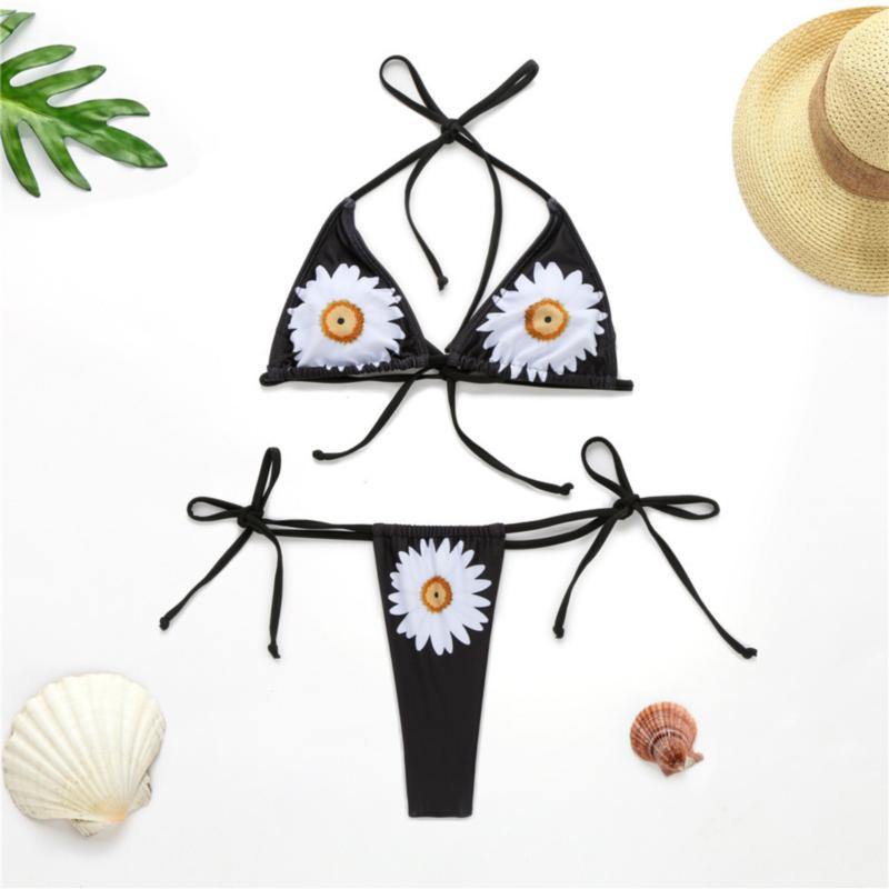 Skip to the end of the images gallery Skip to the beginning of the images gallery New daisies print padded halter-neck sexy two-piece micro bikini - Kevisse